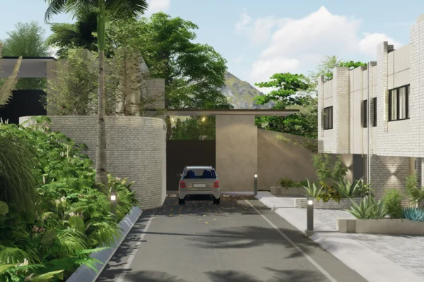 View of a gated entrance surrounded by greenery and contemporary architecture with a vehicle exiting.