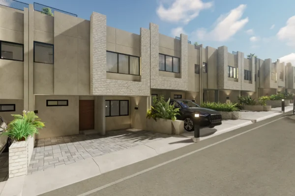 Contemporary townhouse exterior with clean lines, stone accents, and a landscaped entrance.
